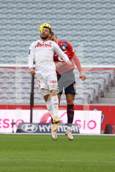2020-12-06 - Duel an the air Kevin Volland 31 AS Monaco during the French championship Ligue 1 football match between Lille OSC and AS Monaco on December 6, 2020 at Pierre Mauroy stadium in Villeneuve-d'Ascq, France - Photo Laurent Sanson / LS Medianord / DPPI - LILLE OSC VS AS MONACO - FRENCH LIGUE 1 - SOCCER
