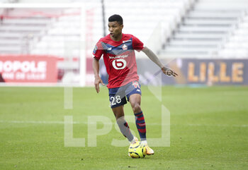 2020-12-06 - Reinildo Mandava of Lille during the French championship Ligue 1 football match between Lille OSC and AS Monaco on December 6, 2020 at Stade Pierre Mauroy in Villeneuve-d'Ascq near Lille, France - Photo Jean Catuffe / DPPI - LILLE OSC VS AS MONACO - FRENCH LIGUE 1 - SOCCER