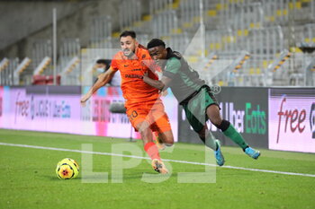 2020-12-12 - Duel 10 Labord Montpellier and Boura 33 RC Lens during the French championship Ligue 1 football match between RC Lens and Montpellier HSC on December 12, 2020 at Bollaert-Delelis stadium in Lens, France - Photo Laurent Sanson / LS Medianord / DPPI - RC LENS VS MONTPELLIER HSC - FRENCH LIGUE 1 - SOCCER
