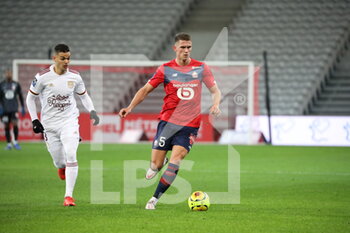 2020-12-13 - Botman 5 losc and Ben Arfa 8 bordeaux during the French Championship Ligue 1 football match between Lille OSC and Girondins de Bordeaux on December 13, 2020 at Pierre Mauroy stadium in Villeneuve-d'Ascq near Lille, France - Photo Laurent Sanson / LS Medianord / DPPI - LILLE OSC VS GIRONDINS DE BORDEAUX - FRENCH LIGUE 1 - SOCCER