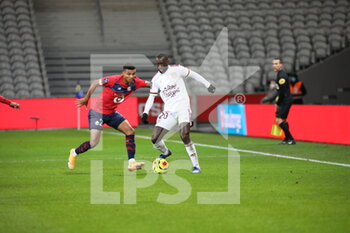 2020-12-13 - reinildo 28 and sabaly 20 bordeaux during the French Championship Ligue 1 football match between Lille OSC and Girondins de Bordeaux on December 13, 2020 at Pierre Mauroy stadium in Villeneuve-d'Ascq near Lille, France - Photo Laurent Sanson / LS Medianord / DPPI - LILLE OSC VS GIRONDINS DE BORDEAUX - FRENCH LIGUE 1 - SOCCER