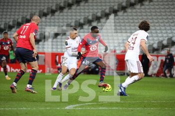 2020-12-13 - Jonathan Ikone 10 losc and Zerkane 17 bordeaux during the French Championship Ligue 1 football match between Lille OSC and Girondins de Bordeaux on December 13, 2020 at Pierre Mauroy stadium in Villeneuve-d'Ascq near Lille, France - Photo Laurent Sanson / LS Medianord / DPPI - LILLE OSC VS GIRONDINS DE BORDEAUX - FRENCH LIGUE 1 - SOCCER