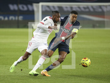 2020-12-13 - Tino Kadewere of Lyon, Presnel Kimpembe of PSG during the French championship Ligue 1 football match between Paris Saint-Germain (PSG) and Olympique Lyonnais (OL) on December 13, 2020 at Parc des Princes stadium in Paris, France - Photo Jean Catuffe / DPPI - PARIS SAINT-GERMAIN (PSG) VS OLYMPIQUE LYONNAIS (OL) - FRENCH LIGUE 1 - SOCCER