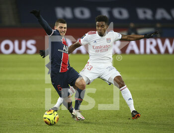 2020-12-13 - Marco Verratti of PSG, Thiago Mendes of Lyon during the French championship Ligue 1 football match between Paris Saint-Germain (PSG) and Olympique Lyonnais (OL) on December 13, 2020 at Parc des Princes stadium in Paris, France - Photo Jean Catuffe / DPPI - PARIS SAINT-GERMAIN (PSG) VS OLYMPIQUE LYONNAIS (OL) - FRENCH LIGUE 1 - SOCCER
