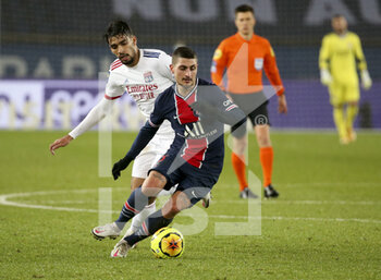 2020-12-13 - Marco Verratti of PSG, Lucas Paqueta of Lyon (left) during the French championship Ligue 1 football match between Paris Saint-Germain (PSG) and Olympique Lyonnais (OL) on December 13, 2020 at Parc des Princes stadium in Paris, France - Photo Jean Catuffe / DPPI - PARIS SAINT-GERMAIN (PSG) VS OLYMPIQUE LYONNAIS (OL) - FRENCH LIGUE 1 - SOCCER