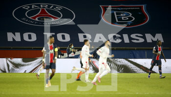 2020-12-13 - Illustration of a banner in the stands 'No to racism' during the French championship Ligue 1 football match between Paris Saint-Germain (PSG) and Olympique Lyonnais (OL) on December 13, 2020 at Parc des Princes stadium in Paris, France - Photo Jean Catuffe / DPPI - PARIS SAINT-GERMAIN (PSG) VS OLYMPIQUE LYONNAIS (OL) - FRENCH LIGUE 1 - SOCCER