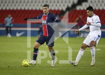 2020-12-13 - Leandro Paredes of PSG, Lucas Paqueta of Lyon during the French championship Ligue 1 football match between Paris Saint-Germain (PSG) and Olympique Lyonnais (OL) on December 13, 2020 at Parc des Princes stadium in Paris, France - Photo Jean Catuffe / DPPI - PARIS SAINT-GERMAIN (PSG) VS OLYMPIQUE LYONNAIS (OL) - FRENCH LIGUE 1 - SOCCER