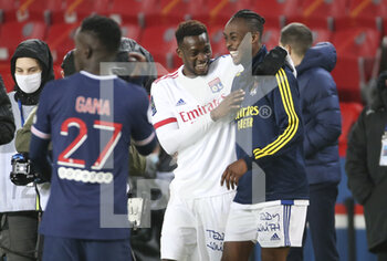 2020-12-13 - Sinaly Diomande and Tino Kadewere of Lyon celebrate the victory following the French championship Ligue 1 football match between Paris Saint-Germain (PSG) and Olympique Lyonnais (OL) on December 13, 2020 at Parc des Princes stadium in Paris, France - Photo Jean Catuffe / DPPI - PARIS SAINT-GERMAIN (PSG) VS OLYMPIQUE LYONNAIS (OL) - FRENCH LIGUE 1 - SOCCER