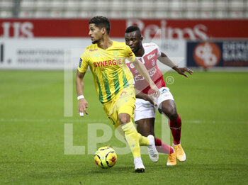 2020-12-16 - Ludovic Blas of FC Nantes, Ghislain Konan of Reims during the French championship Ligue 1 football match between Stade de Reims and FC Nantes on December 16, 2020 at Stade Auguste Delaune in Reims, France - Photo Jean Catuffe / DPPI - STADE DE REIMS VS FC NANTES - FRENCH LIGUE 1 - SOCCER