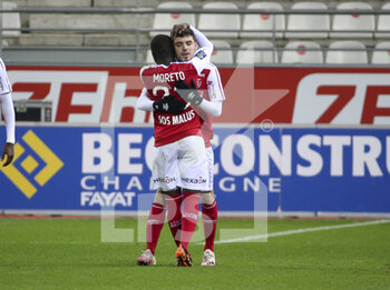 2020-12-16 - Mathieu Cafaro of Reims celebrates his goal with Moreto Cassama during the French championship Ligue 1 football match between Stade de Reims and FC Nantes on December 16, 2020 at Stade Auguste Delaune in Reims, France - Photo Jean Catuffe / DPPI - STADE DE REIMS VS FC NANTES - FRENCH LIGUE 1 - SOCCER