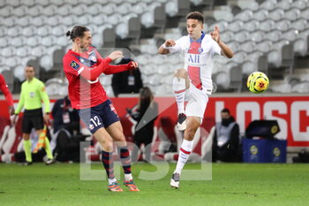 2020-12-20 - Yazici 12 Losc and Kehrer 4 PSG during the French championship Ligue 1 football match between Lille OSC and Paris Saint-Germain on December 20, 2020 at Pierre Mauroy stadium in Villeneuve-d'Ascq near Lille, France - Photo Laurent Sanson / LS Medianord / DPPI - LILLE OSC VS PARIS SAINT-GERMAIN - FRENCH LIGUE 1 - SOCCER