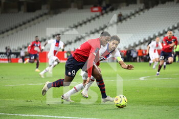 2020-12-20 - Duel David 9 Losc and Marquinhos 5 PSG during the French championship Ligue 1 football match between Lille OSC and Paris Saint-Germain on December 20, 2020 at Pierre Mauroy stadium in Villeneuve-d'Ascq near Lille, France - Photo Laurent Sanson / LS Medianord / DPPI - LILLE OSC VS PARIS SAINT-GERMAIN - FRENCH LIGUE 1 - SOCCER