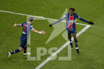 2020-12-23 - Timothee Pembele of PSG celebrates his goal with Angel Di Maria (left) during the French championship Ligue 1 football match between Paris Saint-Germain (PSG) and RC Strasbourg on December 23, 2020 at Parc des Princes stadium in Paris, France - Photo Jean Catuffe / DPPI - PARIS SAINT-GERMAIN (PSG) VS RC STRASBOURG - FRENCH LIGUE 1 - SOCCER