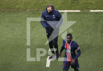 2020-12-23 - Last picture of Thomas Tuchel on the pitch as coach of PSG (he has been fired few hours later) - here with Moise Kean - at the end of the French championship Ligue 1 football match between Paris Saint-Germain (PSG) and RC Strasbourg on December 23, 2020 at Parc des Princes stadium in Paris, France - Photo Jean Catuffe / DPPI - PARIS SAINT-GERMAIN (PSG) VS RC STRASBOURG - FRENCH LIGUE 1 - SOCCER