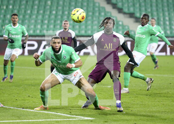 2021-01-06 - Harold Moukoudi of Saint-Etienne, Moise Kean of PSG during the French championship Ligue 1 football match between AS Saint-Etienne (ASSE) and Paris Saint-Germain (PSG) on January 6, 2021 at stade Geoffroy Guichard in Saint-Etienne, France - Photo Jean Catuffe / DPPI - AS SAINT-ETIENNE (ASSE) VS PARIS SAINT-GERMAIN (PSG) - FRENCH LIGUE 1 - SOCCER