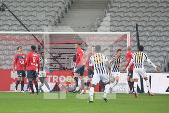 2021-01-06 - Two goal Romain Thomas 24 Angers during the French championship Ligue 1 football match between Lille OSC and Angers SCO on January 6, 2021 at Pierre Mauroy stadium in Villeneuve-d'Ascq near Lille, France - Photo Laurent Sanson / LS Medianord / DPPI - LILLE OSC VS ANGERS SCO - FRENCH LIGUE 1 - SOCCER
