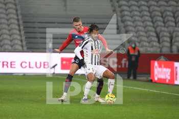 2021-01-06 - Duel Botman 5 LOSC and Diony 9 Angers during the French championship Ligue 1 football match between Lille OSC and Angers SCO on January 6, 2021 at Pierre Mauroy stadium in Villeneuve-d'Ascq near Lille, France - Photo Laurent Sanson / LS Medianord / DPPI - LILLE OSC VS ANGERS SCO - FRENCH LIGUE 1 - SOCCER