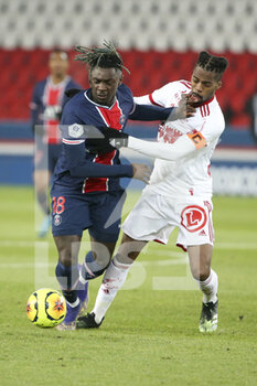 2021-01-09 - Moise Kean of PSG, Jean-Kevin Duverne of Brest during the French championship Ligue 1 football match between Paris Saint-Germain (PSG) and Stade Brestois 29 on January 9, 2021 at Parc des Princes stadium in Paris, France - Photo Jean Catuffe / DPPI - PARIS SAINT-GERMAIN (PSG) AND STADE BRESTOIS - FRENCH LIGUE 1 - SOCCER