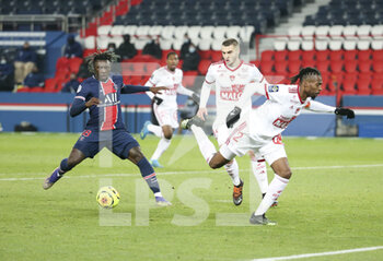 2021-01-09 - Moise Kean of PSG, Brendan Chardonnet, Jean-Kevin Duverne of Brest during the French championship Ligue 1 football match between Paris Saint-Germain (PSG) and Stade Brestois 29 on January 9, 2021 at Parc des Princes stadium in Paris, France - Photo Jean Catuffe / DPPI - PARIS SAINT-GERMAIN (PSG) AND STADE BRESTOIS - FRENCH LIGUE 1 - SOCCER