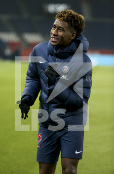 2021-01-09 - Timothee Pembele of PSG warms up during the French championship Ligue 1 football match between Paris Saint-Germain (PSG) and Stade Brestois 29 on January 9, 2021 at Parc des Princes stadium in Paris, France - Photo Jean Catuffe / DPPI - PARIS SAINT-GERMAIN (PSG) AND STADE BRESTOIS - FRENCH LIGUE 1 - SOCCER