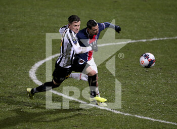 2021-01-16 - Pierrick Capelle of Angers, Angel Di Maria of PSG during the French championship Ligue 1 football match between Angers SCO and Paris Saint-Germain on January 16, 2021 at Stade Raymond Kopa in Angers, France - Photo Jean Catuffe / DPPI - ANGERS SCO AND PARIS SAINT-GERMAIN - FRENCH LIGUE 1 - SOCCER