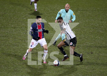 2021-01-16 - Pablo Sarabia of PSG, Souleyman Doumbia of Angers during the French championship Ligue 1 football match between Angers SCO and Paris Saint-Germain on January 16, 2021 at Stade Raymond Kopa in Angers, France - Photo Jean Catuffe / DPPI - ANGERS SCO AND PARIS SAINT-GERMAIN - FRENCH LIGUE 1 - SOCCER