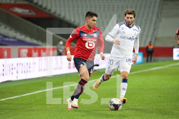 2021-01-17 - ARAUJO 11 LOSC and ZENELI 10 Reims during the French championship Ligue 1 football match between Lille OSC and Stade de Reims on January 17, 2021 at Pierre Mauroy stadium in Villeneuve-d'Ascq near Lille, France - Photo Laurent Sanson / LS Medianord / DPPI - LILLE OSC AND STADE DE REIMS - FRENCH LIGUE 1 - SOCCER