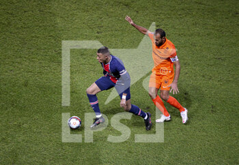 2021-01-22 - Kylian Mbappe of PSG, Vitorino Hilton of Montpellier during the French championship Ligue 1 football match between Paris Saint-Germain (PSG) and Montpellier HSC (MHSC) on January 22, 2021 at Parc des Princes stadium in Paris, France - Photo Jean Catuffe / DPPI - PARIS SAINT-GERMAIN (PSG) AND MONTPELLIER HSC (MHSC) - FRENCH LIGUE 1 - SOCCER
