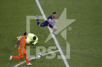 2021-01-22 - Goalkeeper of Montpellier Jonas Omlin commits a fault on Kylian Mbappe of PSG and will receive a red card during the French championship Ligue 1 football match between Paris Saint-Germain (PSG) and Montpellier HSC (MHSC) on January 22, 2021 at Parc des Princes stadium in Paris, France - Photo Jean Catuffe / DPPI - PARIS SAINT-GERMAIN (PSG) AND MONTPELLIER HSC (MHSC) - FRENCH LIGUE 1 - SOCCER