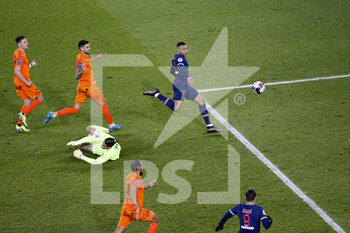 2021-01-22 - Kylian Mbappe of PSG scores his first goal, passing by goalkeeper of Montpellier Dimitry Bertaud, Arnaud Souquet, Pedro Mendes of Montpellier during the French championship Ligue 1 football match between Paris Saint-Germain (PSG) and Montpellier HSC (MHSC) on January 22, 2021 at Parc des Princes stadium in Paris, France - Photo Jean Catuffe / DPPI - PARIS SAINT-GERMAIN (PSG) AND MONTPELLIER HSC (MHSC) - FRENCH LIGUE 1 - SOCCER