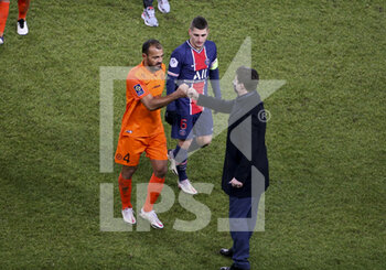 2021-01-22 - Coach of PSG Mauricio Pochettino salutes Vitorino Hilton of Montpellier, Marco Verratti of PSG following the French championship Ligue 1 football match between Paris Saint-Germain (PSG) and Montpellier HSC (MHSC) on January 22, 2021 at Parc des Princes stadium in Paris, France - Photo Jean Catuffe / DPPI - PARIS SAINT-GERMAIN (PSG) AND MONTPELLIER HSC (MHSC) - FRENCH LIGUE 1 - SOCCER