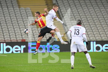 2021-01-23 - On the air Gradit 24 Lens and Rasmussen Kasper Dolberg 9 Nice during the French championship Ligue 1 football match between RC Lens and OGC Nice on January 23, 2021 at Bollaert-Delelis stadium in Lens, France - Photo Laurent Sanson / LS Medianord / DPPI - RC LENS AND OGC NICE - FRENCH LIGUE 1 - SOCCER