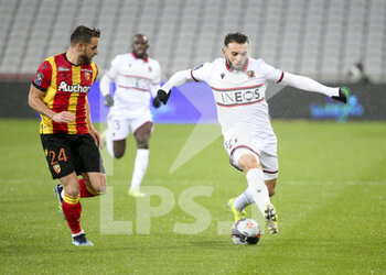 2021-01-23 - Amine Gouiri of Nice, Jonathan Gradit of Lens (left) during the French championship Ligue 1 football match between RC Lens and OGC Nice on January 23, 2021 at stade Bollaert-Delelis in Lens, France - Photo Jean Catuffe / DPPI - RC LENS AND OGC NICE - FRENCH LIGUE 1 - SOCCER