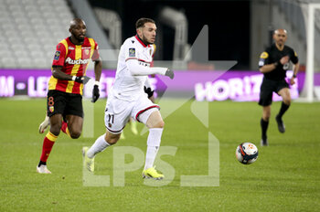 2021-01-23 - Amine Gouiri of Nice, Seko Fofana of Lens (left) during the French championship Ligue 1 football match between RC Lens and OGC Nice on January 23, 2021 at stade Bollaert-Delelis in Lens, France - Photo Jean Catuffe / DPPI - RC LENS AND OGC NICE - FRENCH LIGUE 1 - SOCCER
