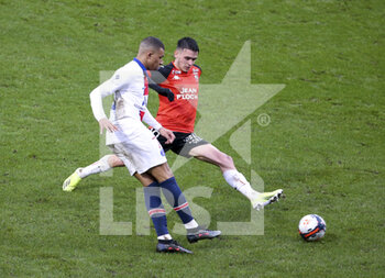 2021-01-31 - Kylian Mbappe of PSG, Enzo Le Fee of Lorient during the French championship Ligue 1 football match between FC Lorient and Paris Saint-Germain on January 31, 2021 at Stade du Moustoir - Yves Allainmat in Lorient, France - Photo Jean Catuffe / DPPI - FC LORIENT AND PARIS SAINT-GERMAIN - FRENCH LIGUE 1 - SOCCER