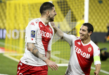 2021-01-31 - Guillermo Maripan of Monaco celebrates his goal with Wissam Ben Yeddder during the French championship Ligue 1 football match between FC Nantes and AS Monaco on January 31, 2021 at Stade de La Beaujoire - Louis Fonteneau in Nantes, France - Photo Jean Catuffe / DPPI - FC NANTES AND AS MONACO - FRENCH LIGUE 1 - SOCCER