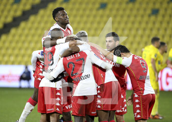 2021-01-31 - Kevin Volland of Monaco celebrates his goal with Benoit Badiashile and teammates during the French championship Ligue 1 football match between FC Nantes and AS Monaco on January 31, 2021 at Stade de La Beaujoire - Louis Fonteneau in Nantes, France - Photo Jean Catuffe / DPPI - FC NANTES AND AS MONACO - FRENCH LIGUE 1 - SOCCER