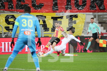 2021-02-03 - Duel Clauss 11 Lens and Sakai 2 Marseille during the French championship Ligue 1 football match between RC Lens and Olympique de Marseille on February 3, 2021 at Bollaert-Delelis stadium in Lens, France - Photo Laurent Sanson / LS Medianord / DPPI - RC LENS AND OLYMPIQUE DE MARSEILLE - FRENCH LIGUE 1 - SOCCER