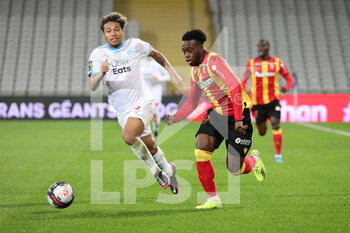 2021-02-03 - Kalimuendo 29 Lens and Kamara 4 Marseille during the French championship Ligue 1 football match between RC Lens and Olympique de Marseille on February 3, 2021 at Bollaert-Delelis stadium in Lens, France - Photo Laurent Sanson / LS Medianord / DPPI - RC LENS AND OLYMPIQUE DE MARSEILLE - FRENCH LIGUE 1 - SOCCER