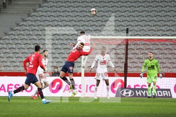 2021-02-14 - Duel on the air PERRAUD Romian 18 Brest and XEKA 8 LOSC during the French championship Ligue 1 football match between Lille OSC and Stade Brestois 29 on February 14, 2021 at Pierre Mauroy stadium in Villeneuve-d'Ascq near Lille, France - Photo Laurent Sanson / LS Medianord / DPPI - LILLE OSC (LOSC) AND STADE BRESTOIS 29 (BREST) - FRENCH LIGUE 1 - SOCCER
