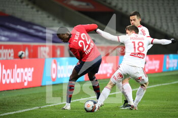 2021-02-14 - Weah 22 and Perraud 18 Brest during the French championship Ligue 1 football match between Lille OSC and Stade Brestois 29 on February 14, 2021 at Pierre Mauroy stadium in Villeneuve-d'Ascq near Lille, France - Photo Laurent Sanson / LS Medianord / DPPI - LILLE OSC (LOSC) AND STADE BRESTOIS 29 (BREST) - FRENCH LIGUE 1 - SOCCER