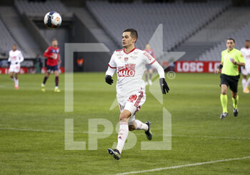 2021-02-14 - Romain Faivre of Brest during the French championship Ligue 1 football match between Lille OSC (LOSC) and Stade Brestois 29 (Brest) on February 14, 2021 at Stade Pierre Mauroy in Villeneuve-d'Ascq near Lille, France - Photo Jean Catuffe / DPPI - LILLE OSC (LOSC) AND STADE BRESTOIS 29 (BREST) - FRENCH LIGUE 1 - SOCCER