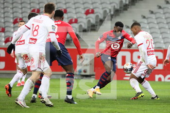 2021-02-14 - Action BAMBA 7 LOSC and PIERRE GABRIEL 20 Brest during the French championship Ligue 1 football match between Lille OSC and Stade Brestois 29 on February 14, 2021 at Pierre Mauroy stadium in Villeneuve-d'Ascq near Lille, France - Photo Laurent Sanson / LS Medianord / DPPI - LILLE OSC (LOSC) AND STADE BRESTOIS 29 (BREST) - FRENCH LIGUE 1 - SOCCER
