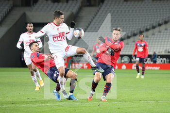 2021-02-14 - Duel Romain FAIVRE 21 Brest and CELIK 2 YAZICI 12 LOSC during the French championship Ligue 1 football match between Lille OSC and Stade Brestois 29 on February 14, 2021 at Pierre Mauroy stadium in Villeneuve-d'Ascq near Lille, France - Photo Laurent Sanson / LS Medianord / DPPI - LILLE OSC (LOSC) AND STADE BRESTOIS 29 (BREST) - FRENCH LIGUE 1 - SOCCER