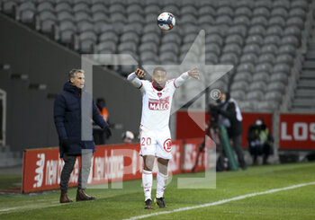 2021-02-14 - Ronael Pierre-Gabriel of Brest, coach of Stade Brestois 29 Olivier Dall'Oglio (left) during the French championship Ligue 1 football match between Lille OSC (LOSC) and Stade Brestois 29 (Brest) on February 14, 2021 at Stade Pierre Mauroy in Villeneuve-d'Ascq near Lille, France - Photo Jean Catuffe / DPPI - LILLE OSC (LOSC) AND STADE BRESTOIS 29 (BREST) - FRENCH LIGUE 1 - SOCCER