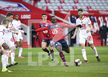 2021-02-14 - Jonathan Ikone of Lille, Paul Lasne of Brest during the French championship Ligue 1 football match between Lille OSC (LOSC) and Stade Brestois 29 (Brest) on February 14, 2021 at Stade Pierre Mauroy in Villeneuve-d'Ascq near Lille, France - Photo Jean Catuffe / DPPI - LILLE OSC (LOSC) AND STADE BRESTOIS 29 (BREST) - FRENCH LIGUE 1 - SOCCER