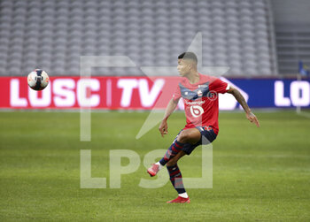 2021-02-14 - Reinildo Mandava of Lille during the French championship Ligue 1 football match between Lille OSC (LOSC) and Stade Brestois 29 (Brest) on February 14, 2021 at Stade Pierre Mauroy in Villeneuve-d'Ascq near Lille, France - Photo Jean Catuffe / DPPI - LILLE OSC (LOSC) AND STADE BRESTOIS 29 (BREST) - FRENCH LIGUE 1 - SOCCER