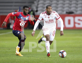 2021-02-14 - Ronael Pierre-Gabriel of Brest, Jonathan Bamba of Lille (left) during the French championship Ligue 1 football match between Lille OSC (LOSC) and Stade Brestois 29 (Brest) on February 14, 2021 at Stade Pierre Mauroy in Villeneuve-d'Ascq near Lille, France - Photo Jean Catuffe / DPPI - LILLE OSC (LOSC) AND STADE BRESTOIS 29 (BREST) - FRENCH LIGUE 1 - SOCCER