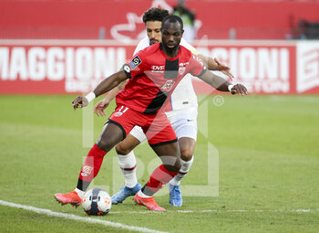 2021-02-27 - Moussa Konate of Dijon, Marquinhos of PSG during the French championship Ligue 1 football match between Dijon FCO (DFCO) and Paris Saint-Germain (PSG) on February 27, 2021 at Stade Gaston Gerard in Dijon, France - Photo Jean Catuffe / DPPI - DIJON FCO (DFCO) AND PARIS SAINT-GERMAIN (PSG) - FRENCH LIGUE 1 - SOCCER