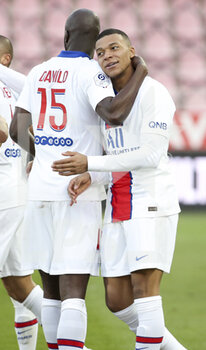2021-02-27 - Kylian Mbappe of PSG celebrates his second goal with Danilo Pereira (left) during the French championship Ligue 1 football match between Dijon FCO (DFCO) and Paris Saint-Germain (PSG) on February 27, 2021 at Stade Gaston Gerard in Dijon, France - Photo Jean Catuffe / DPPI - DIJON FCO (DFCO) AND PARIS SAINT-GERMAIN (PSG) - FRENCH LIGUE 1 - SOCCER